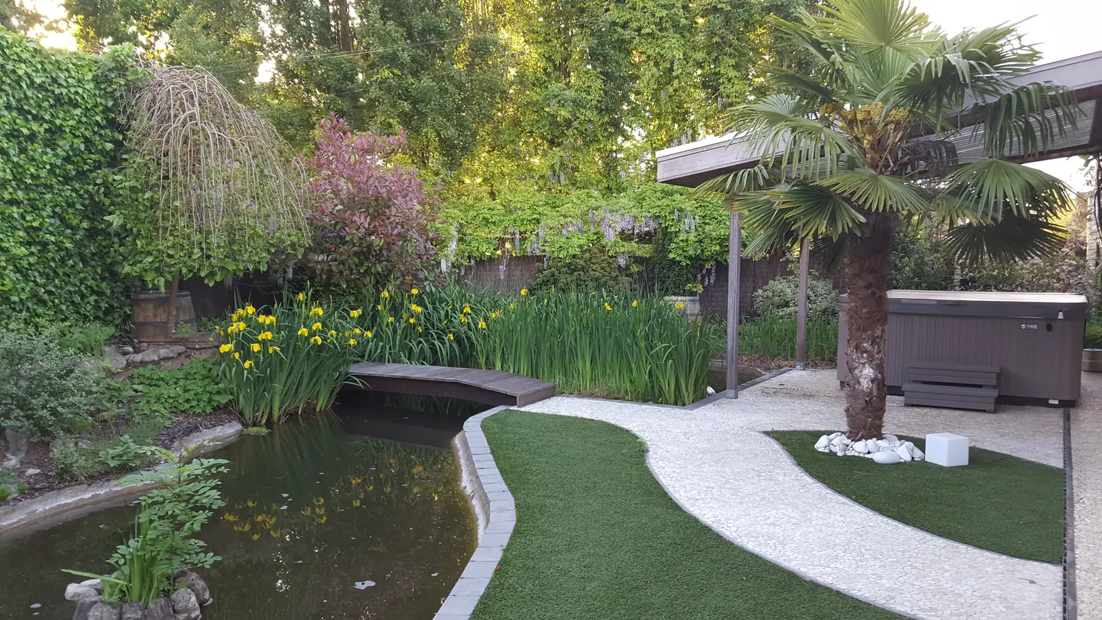 Landschapstuin met vijver bij Wellness at Hulste - foto 1